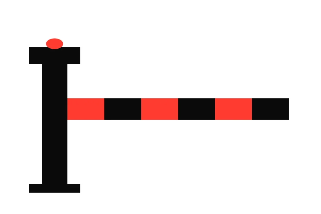 A barrier arm in red and black lowered from its post, a live market suspended while the book reprices